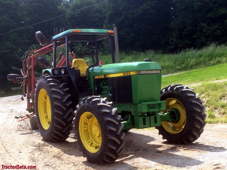 John Deere 3155 with four-post ROPS canopy, right side.