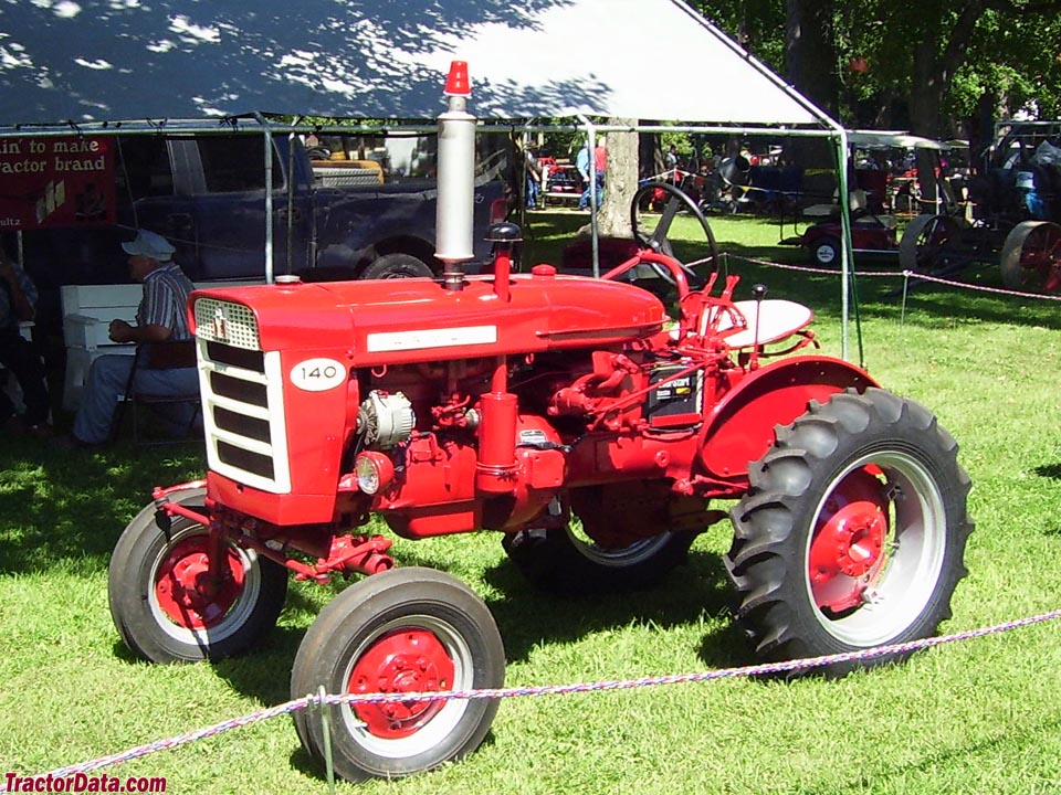 Early (pre-1963) Farmall 140 with white horizontal grill.