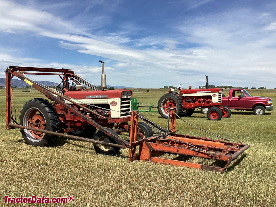 1960 Farmall 460 diesel with Farmhand F-10 loader and bale grappel.