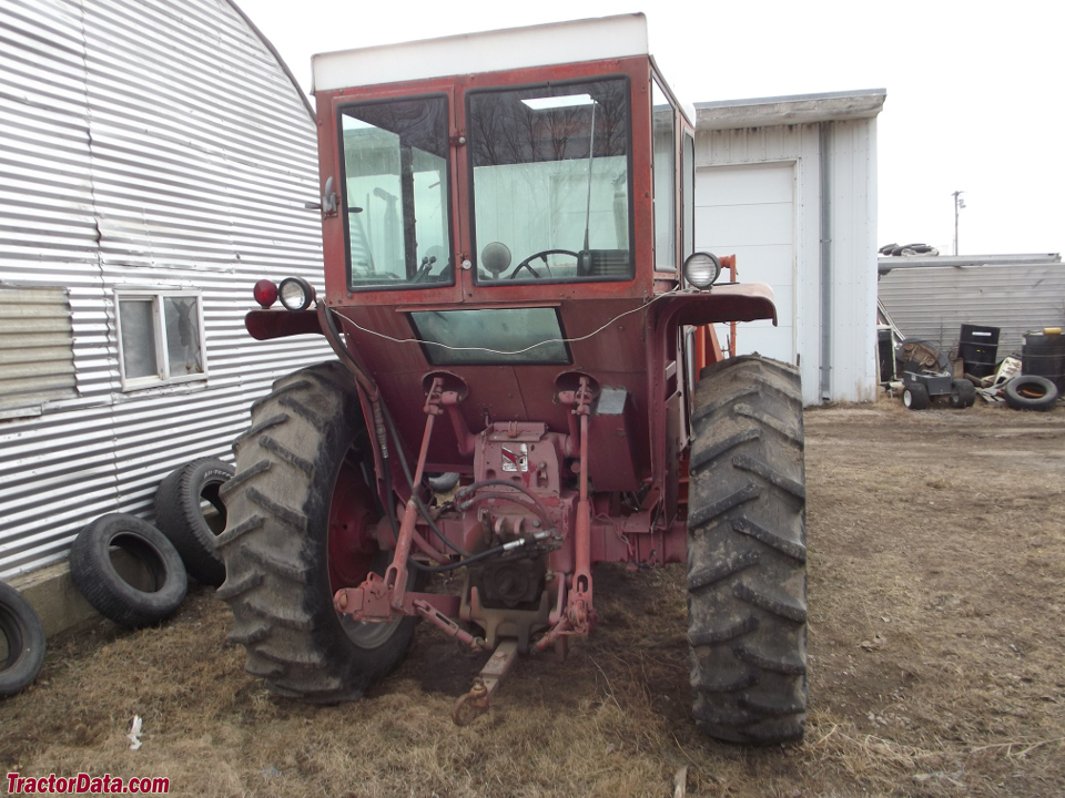 Farmall 544 with Du-All loader and Year A-Round cab.