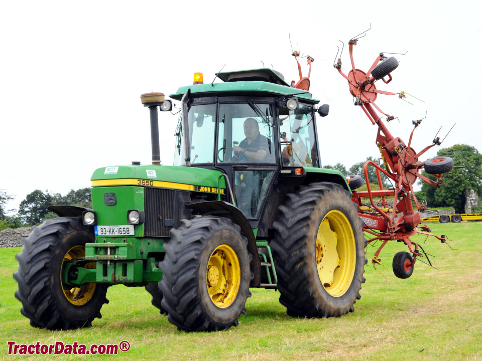 John Deere 3650 with tedder, front-left view.