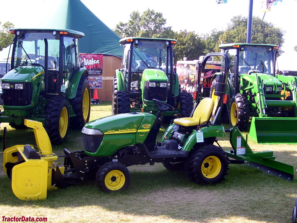 John Deere 2305 with snowblower and rear blade, left side.