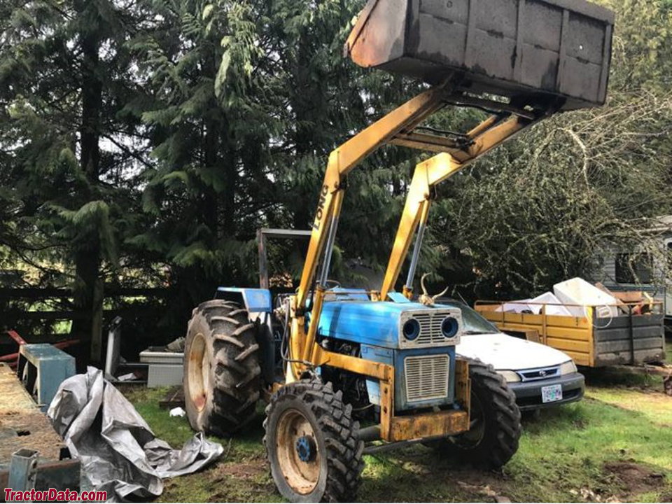 Four-wheel drive Long 560 with front-end loader.