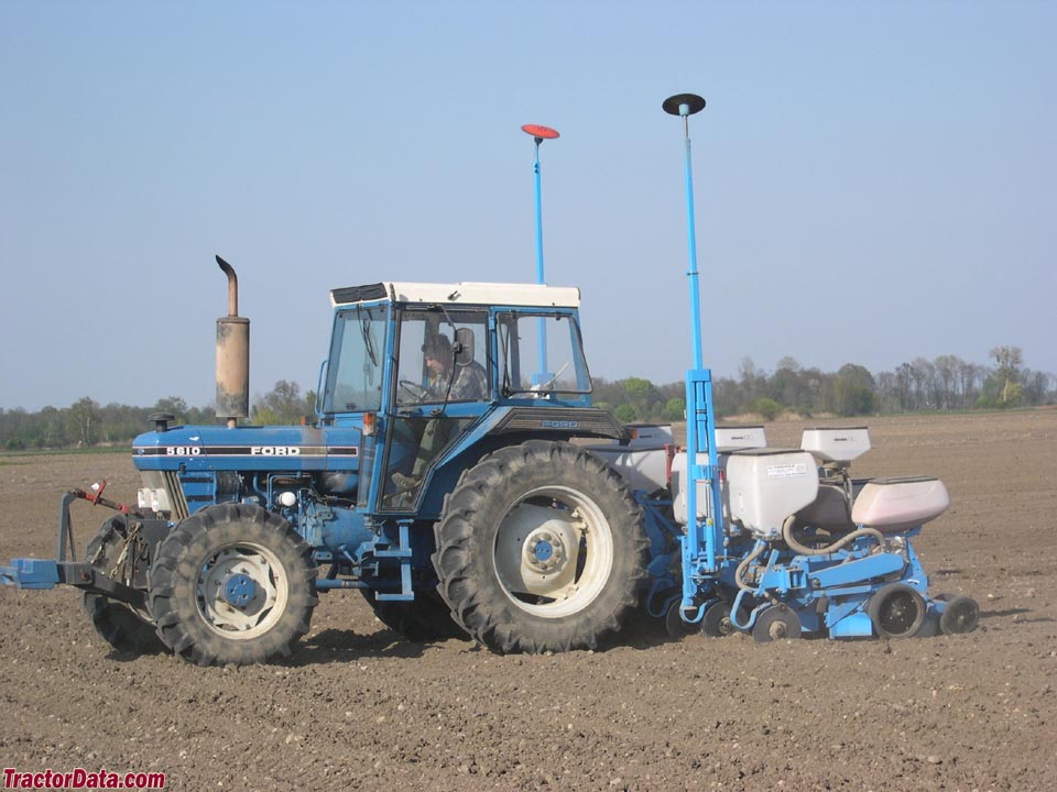 Ford 5610 Series II with planter.