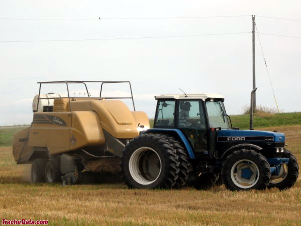 Ford 8340 with baler, right side.