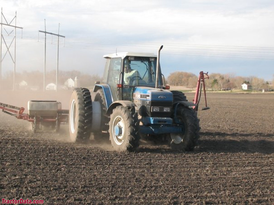 Ford 8340 with planter, front view.