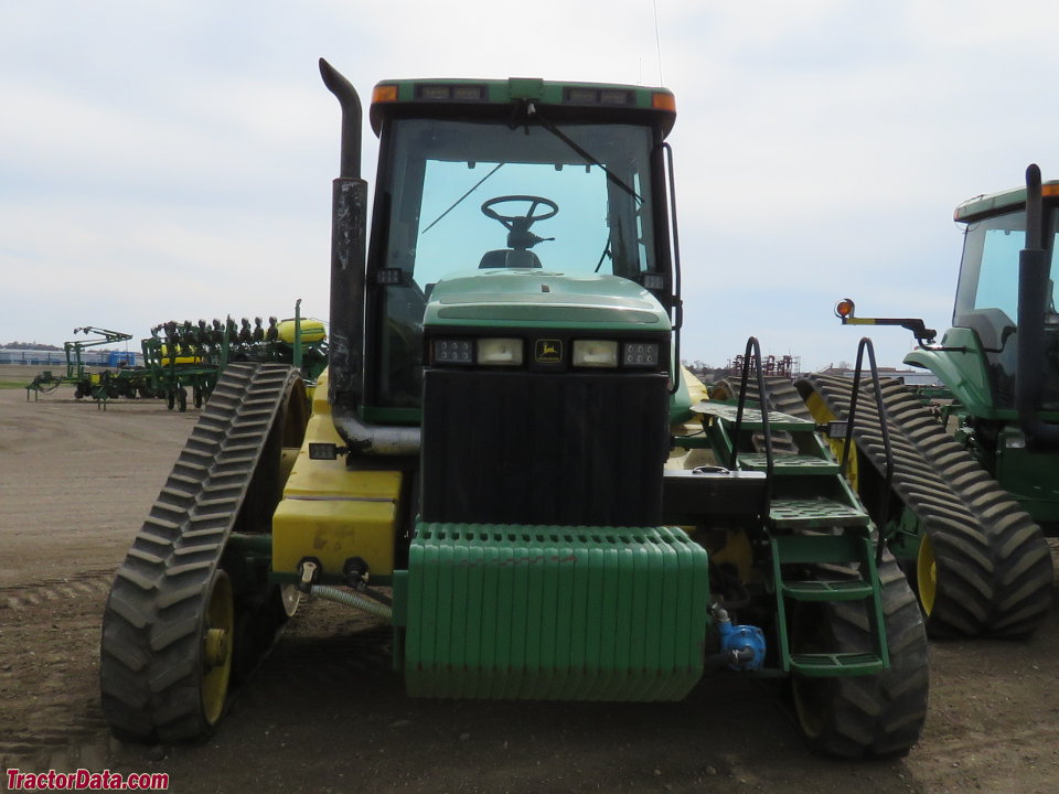 John Deere 8300T with mounted tanks.