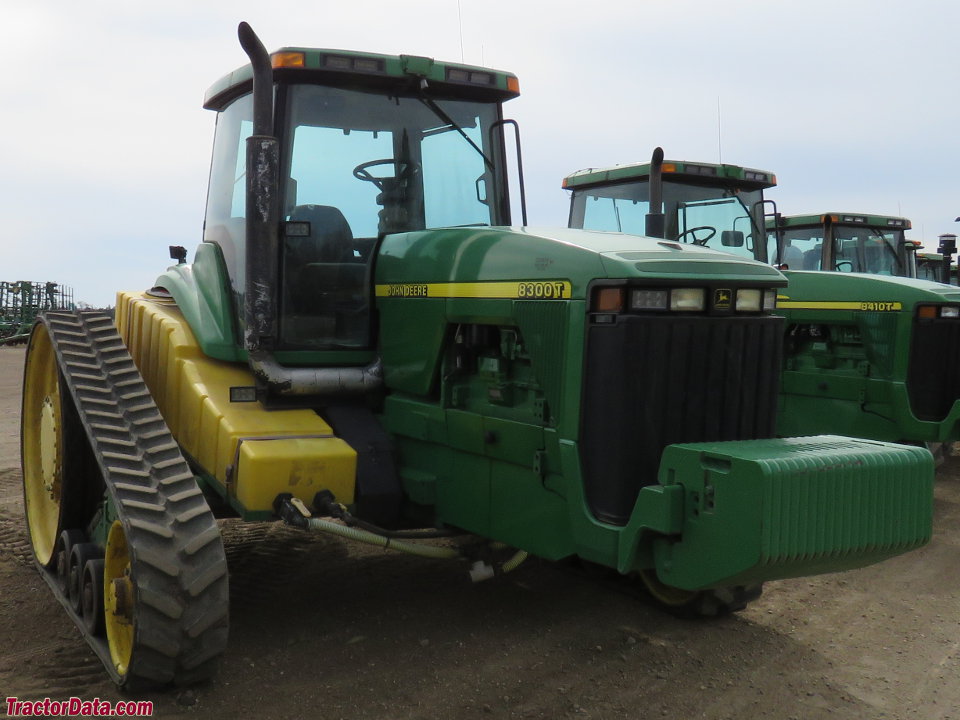 John Deere 8300T with mounted tanks.
