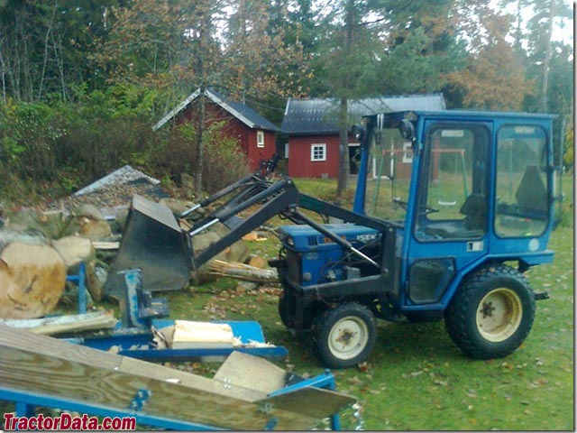 Iseki TX 1500F with loader and cab.