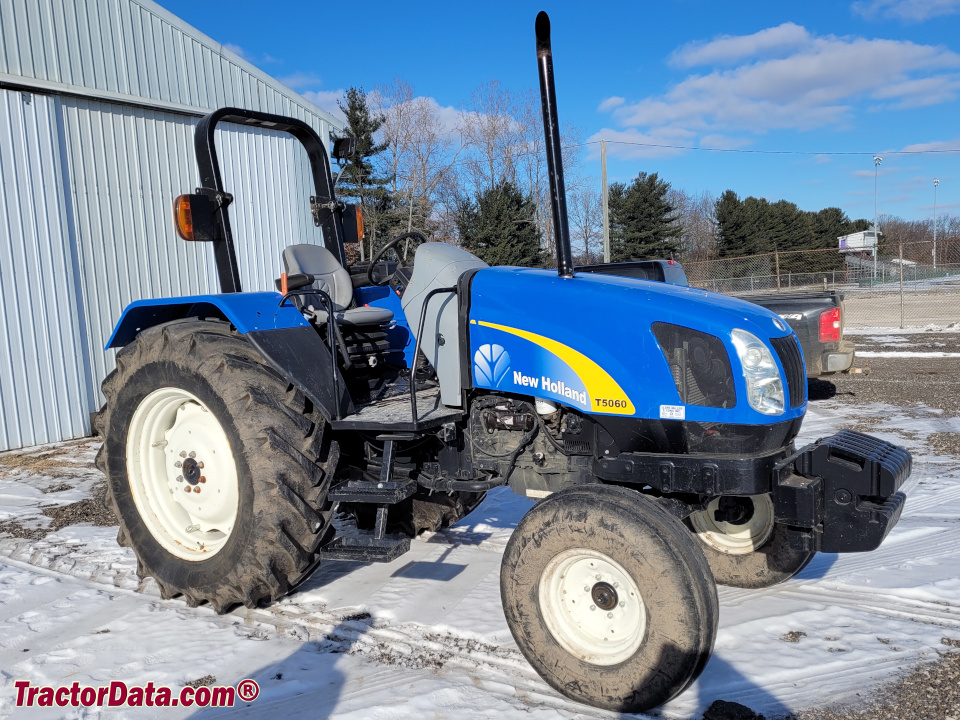 Two-wheel drive New Holland T5060 with ROPS.