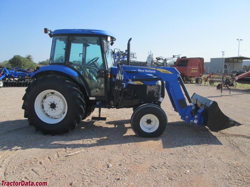 New Holland TD80D with cab and front-end loader.
