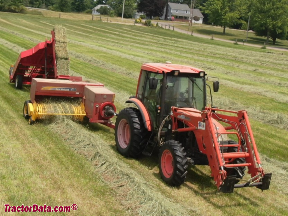 Kioti DK 75 baling hay.