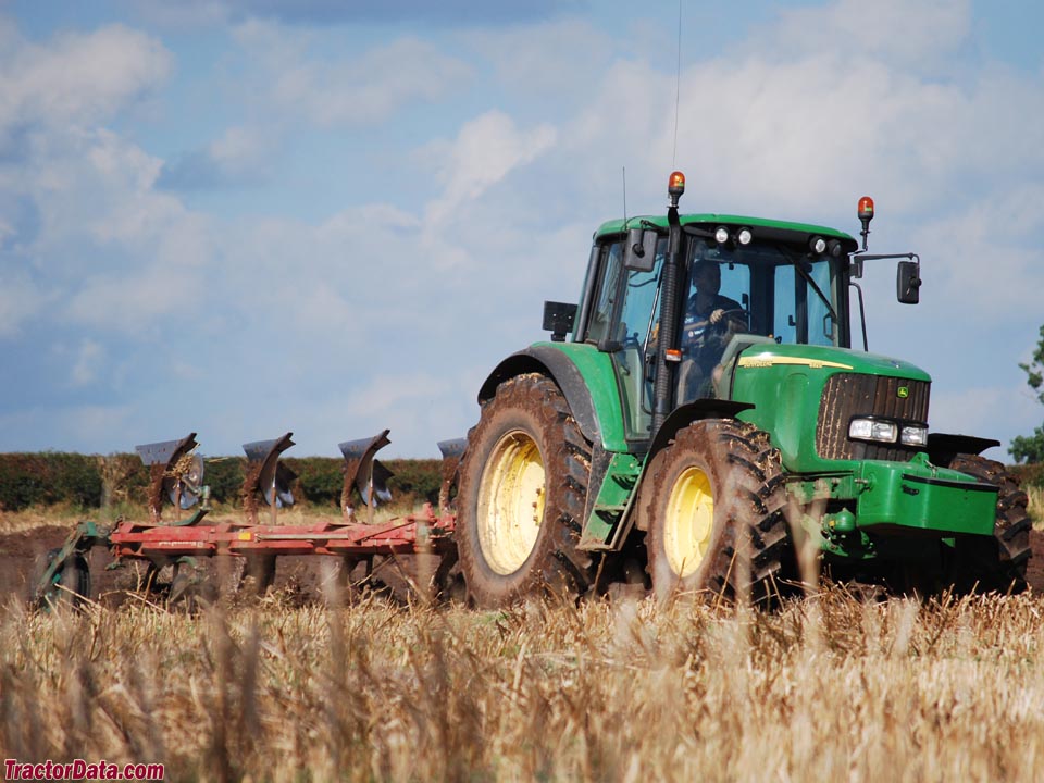 John Deere 6920 with plow, right side.