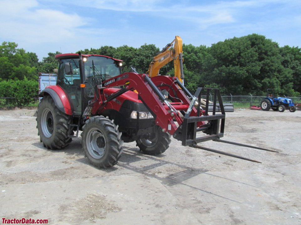 Case IH Farmall 85C with cab and loader.