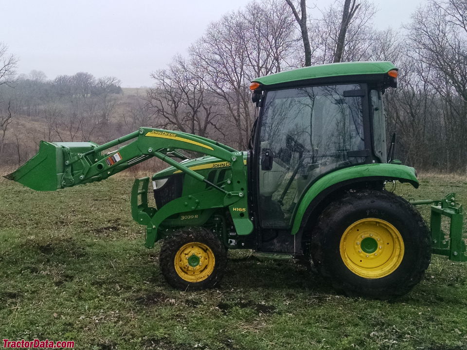 John Deere 3039R with cab and H165 front-end loader.