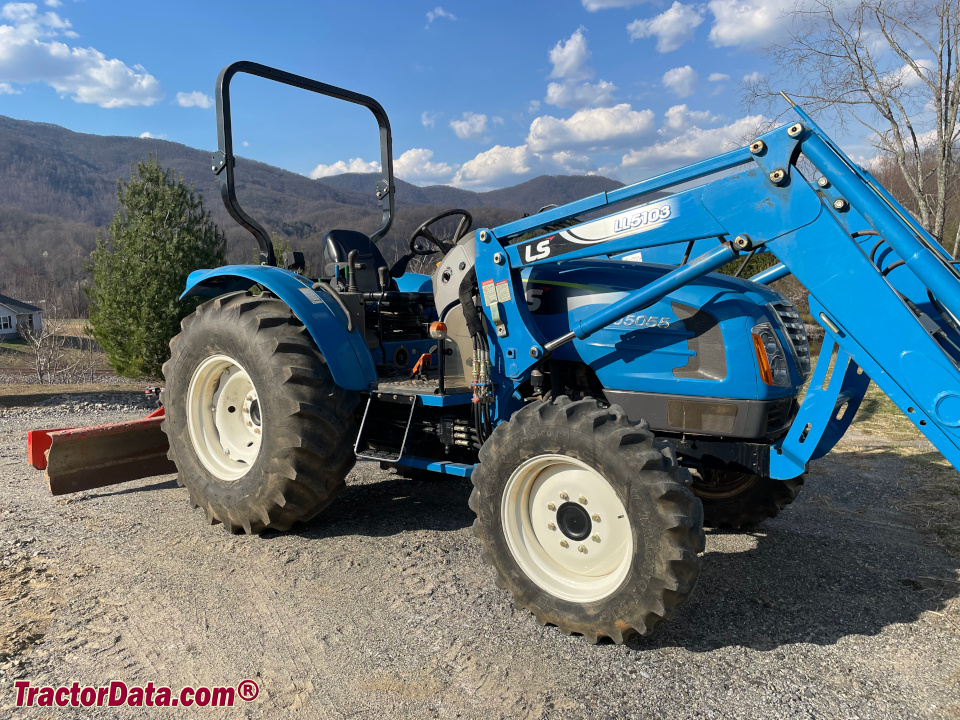 Two Farmhand 100 tractors with a Farm Handy utility vehicle.
