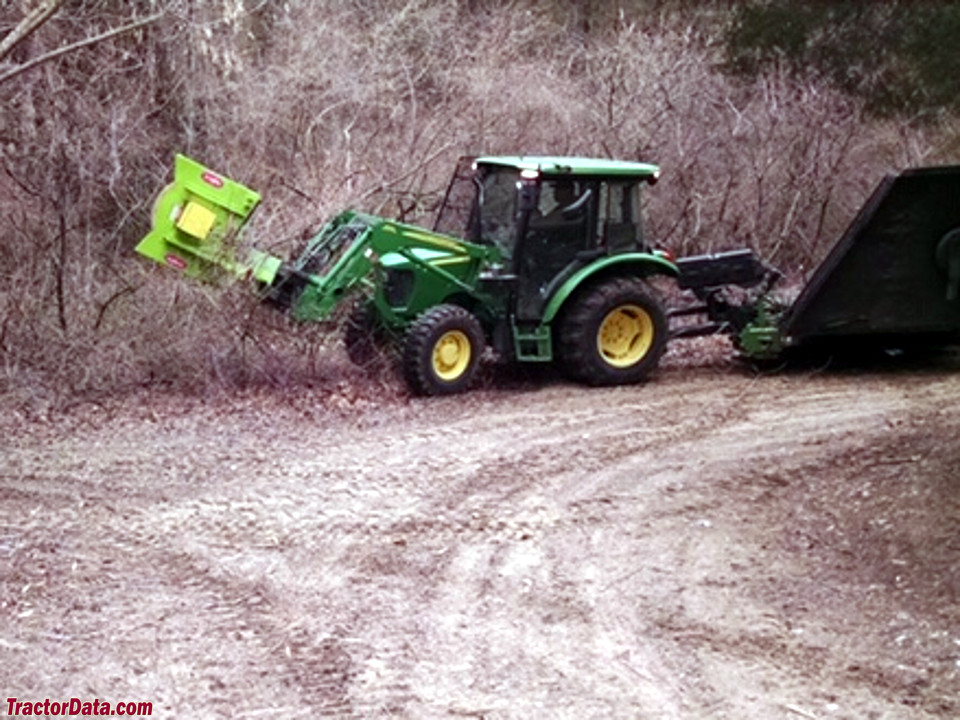 John Deere 5065E trimming bike trails in Michigan.