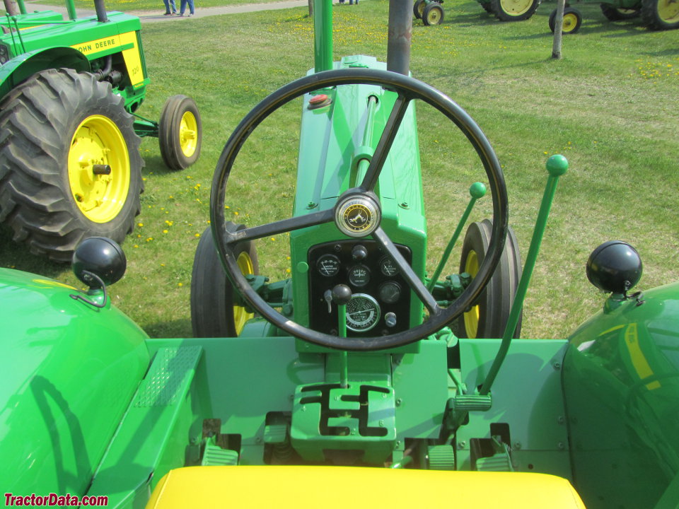 John Deere 620 Standard operator station and controls.