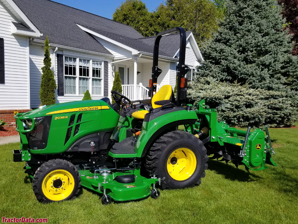 John Deere 2038R with mid-mount mower and tiller.