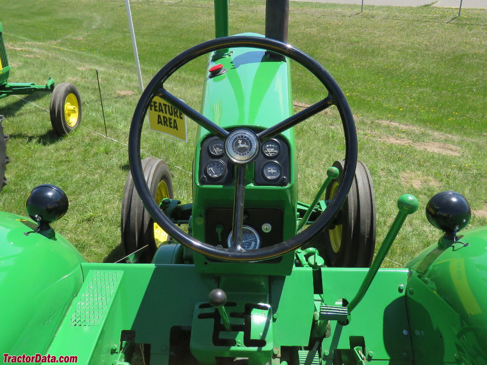 John Deere 630 Standard operator station and controls.