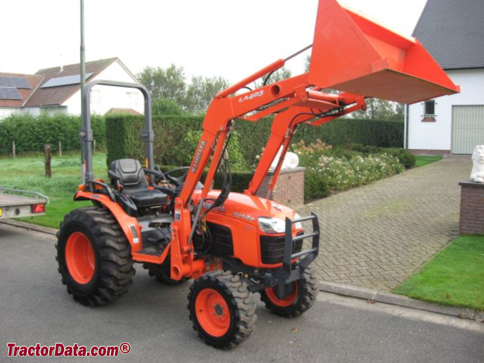 European Kubota B3030 compact utility tractor with with ROPS and LA403 front-end loader.