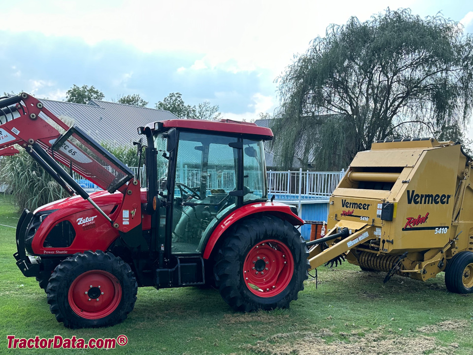 Zetor M70 utility tractor with ZC65 with round baler.