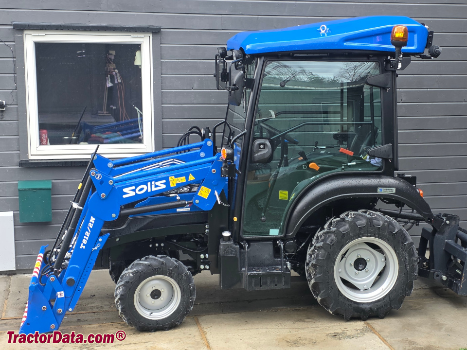 Solis H26 compact utility tractor with cab and T812 front-end loader.